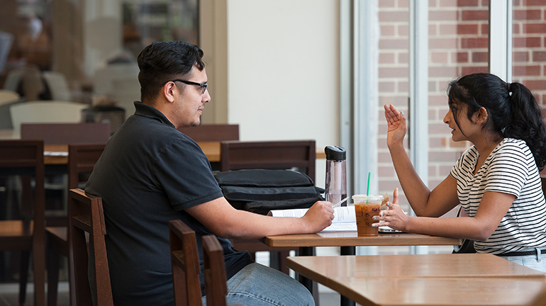 Two students discussing