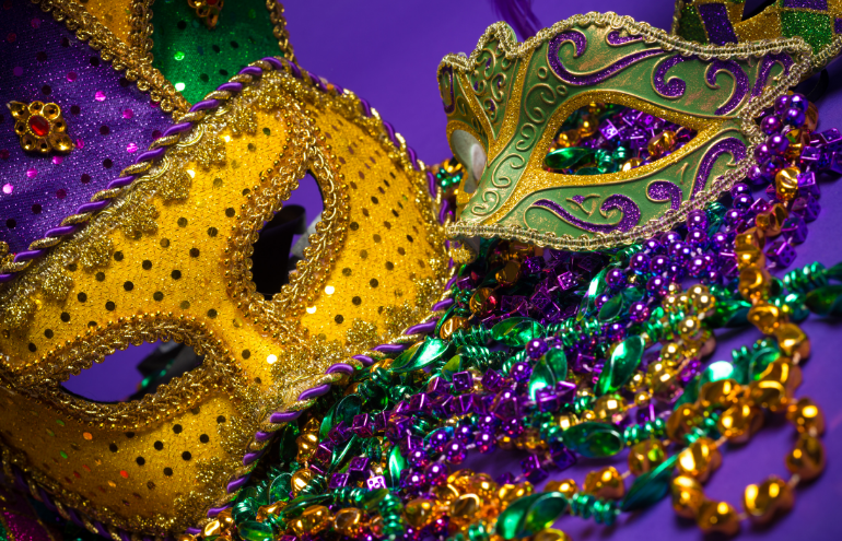 Photo of traditional Mardi Gras masks and beads